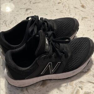 New Balance men’s 520 Black and White Running Shoes.  Size 9